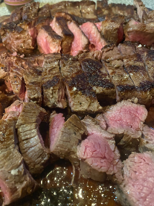 Sliced cooked Carrell Farms water buffalo flat iron steak