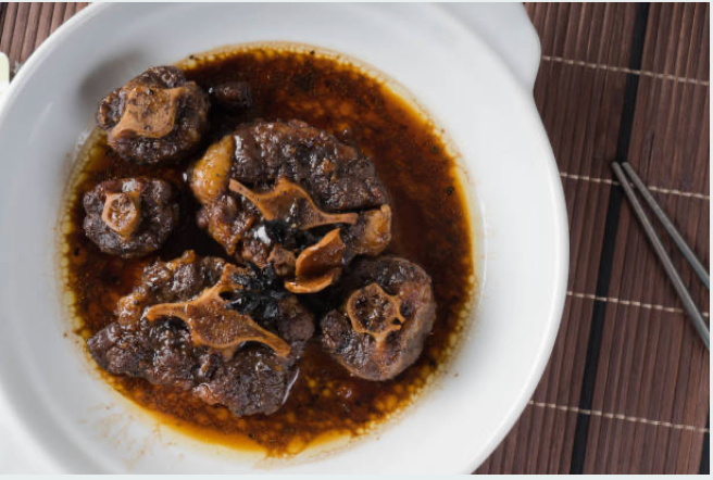 Braised Carrell Farms water buffalo oxtail in a rich sauce
